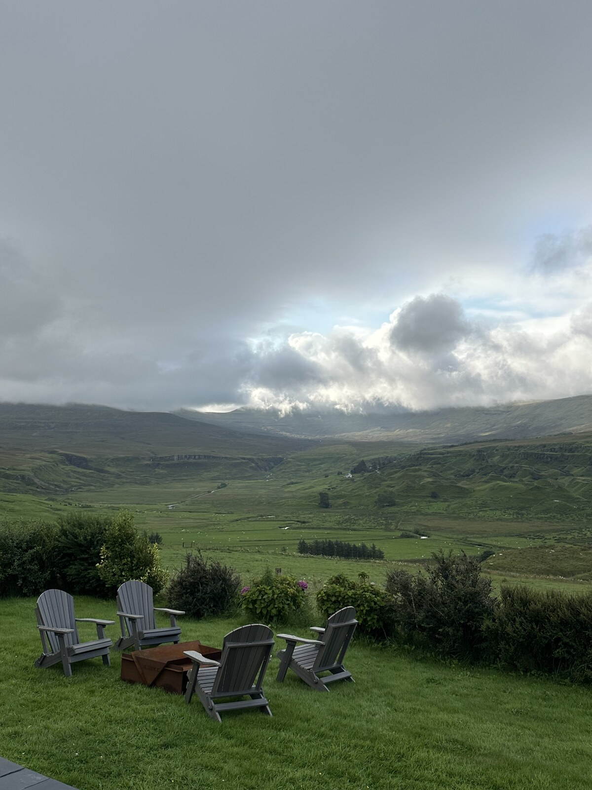 Garden seating overlooking the valley at Gleann Síth House