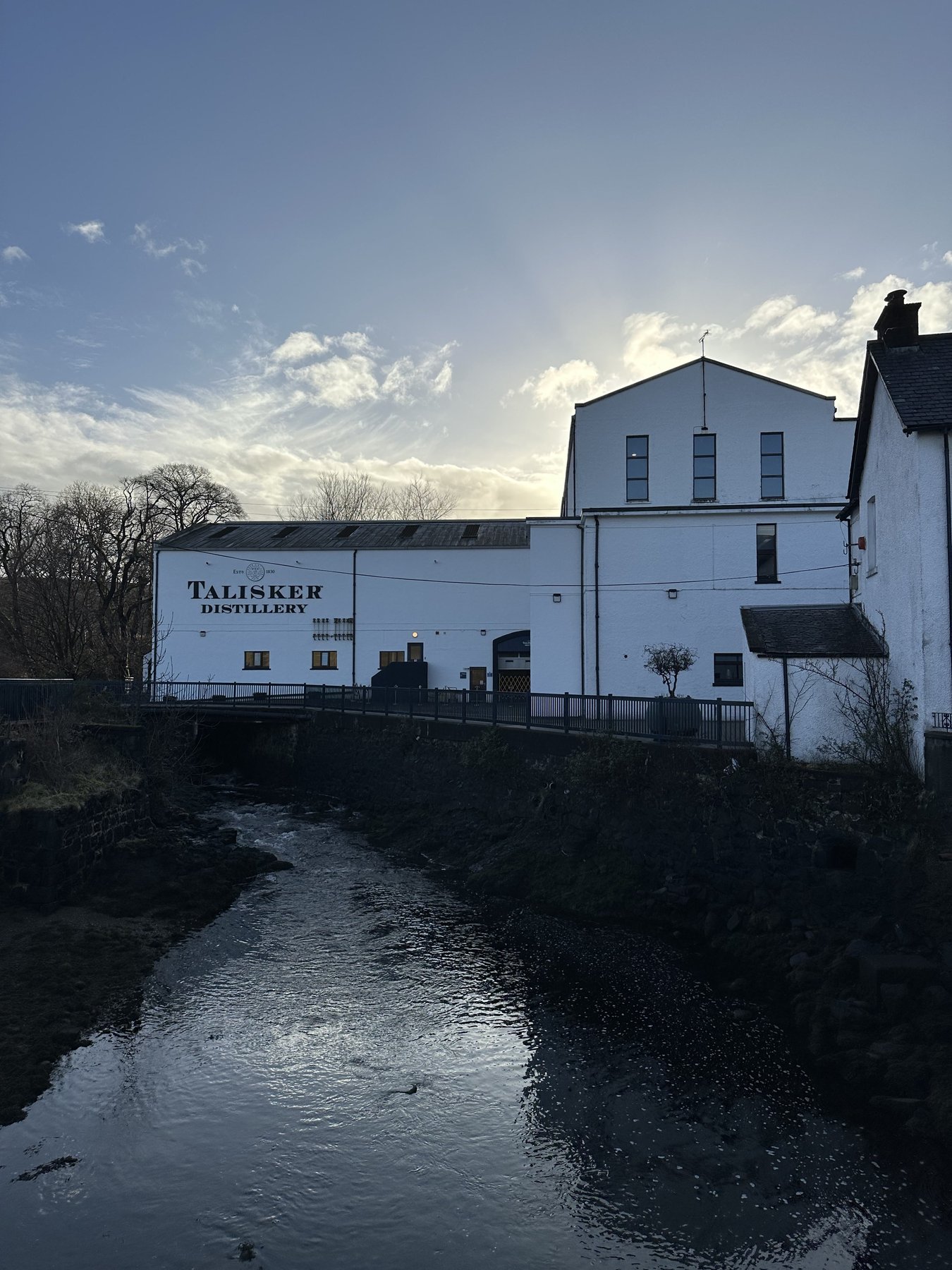 Talisker Distillery on the shore of Loch Harport, Carbost, Isle of Skye